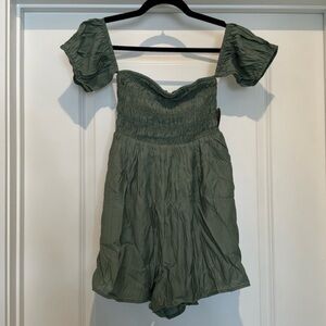 Puff sleeve romper with strapless off the shoulder built in padding with pockets